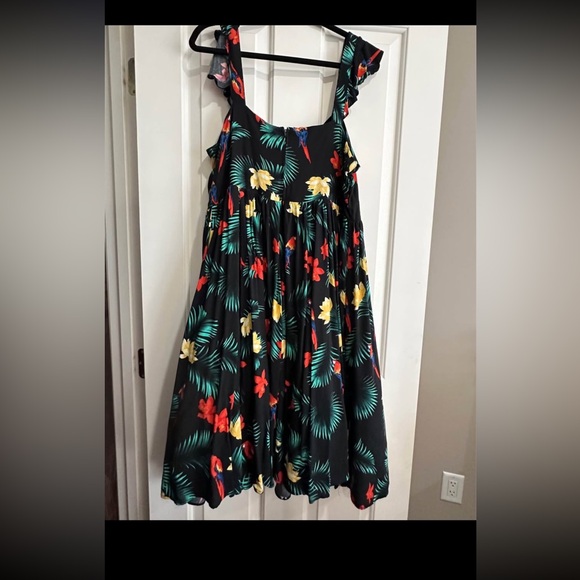 TORRID Retro Chic Black Dress with Vibrant Floral Accents and Crinoline - Picture 2 of 5